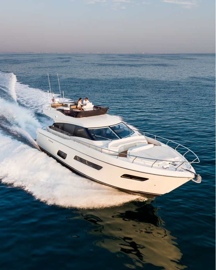 Luxury yacht cruising through deep blue waters